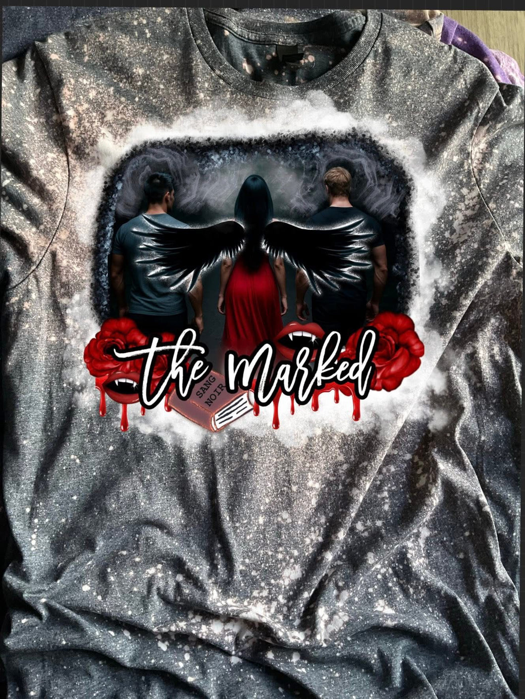 The marked tee